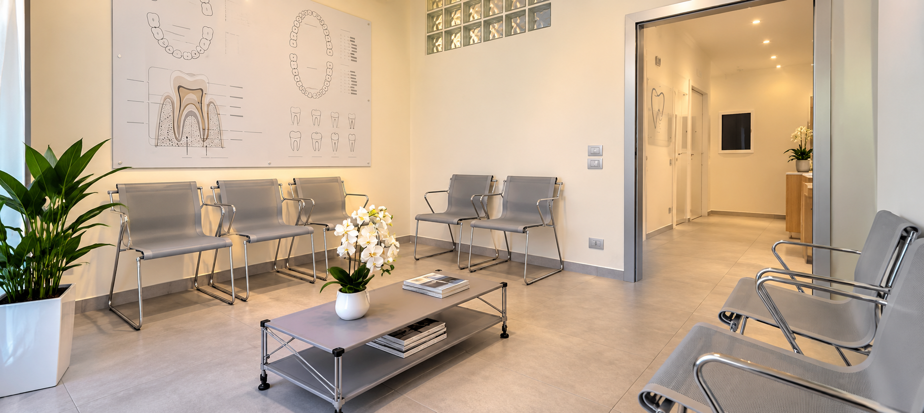 Sala d’attesa dello Studio Dentistico D’Isanto a Pozzuoli, ambiente moderno, luminoso e accogliente per i pazienti.